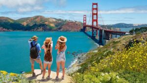 Family looking over San Francisco Bay and Golden Gate Bridge